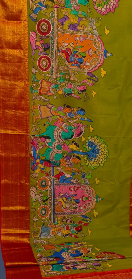 Karigar's Kalamkari pen work on Kanchi Silk Saree