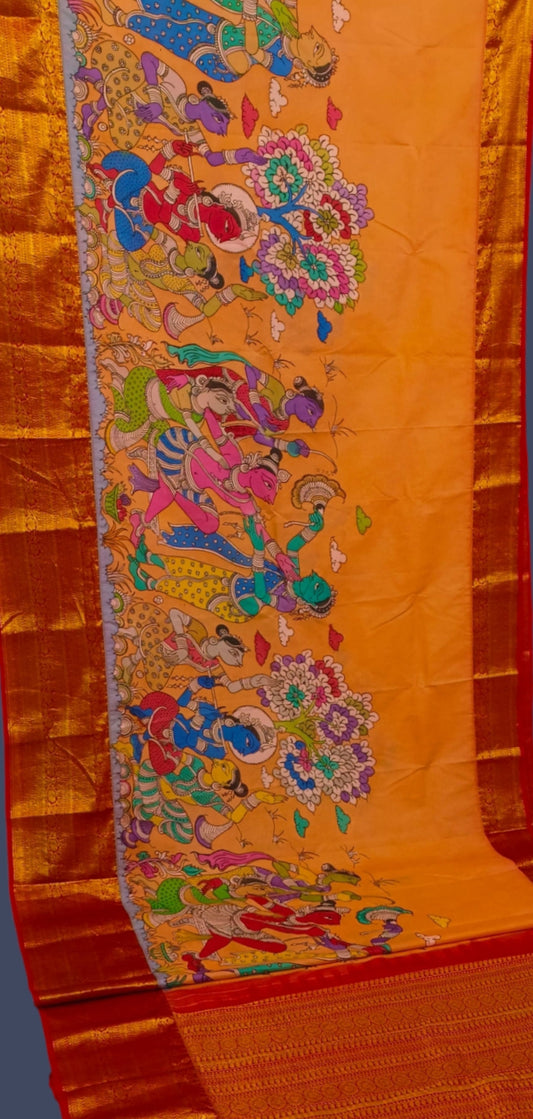 Karigar's Kalamkari pen work on Kanchi Silk Saree