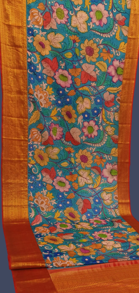 Karigar's Kalamkari pen work on Kanchi Silk Saree