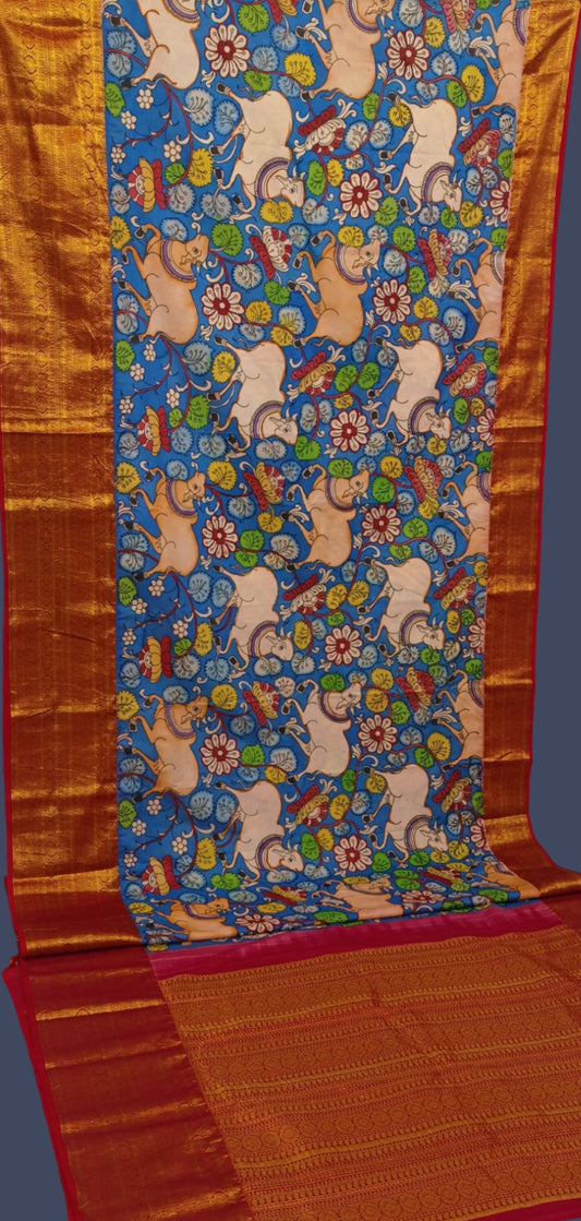 Karigar's Kalamkari pen work on Kanchi Silk Saree