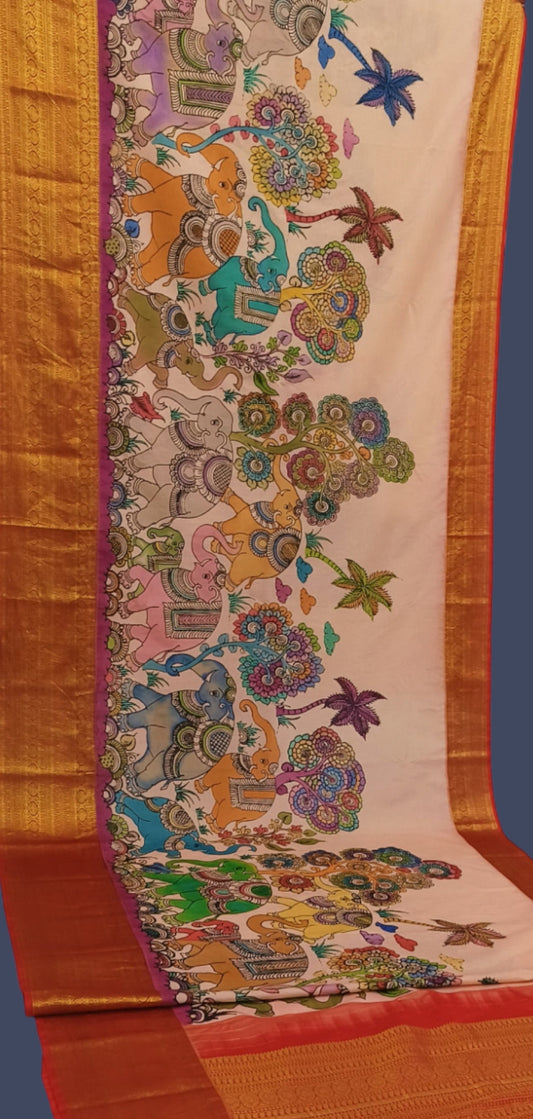 Karigar's Kalamkari pen work on Kanchi Silk Saree